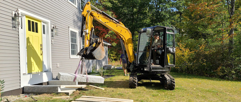 NH Mini Excavator For Hire - Granite Steps Placed